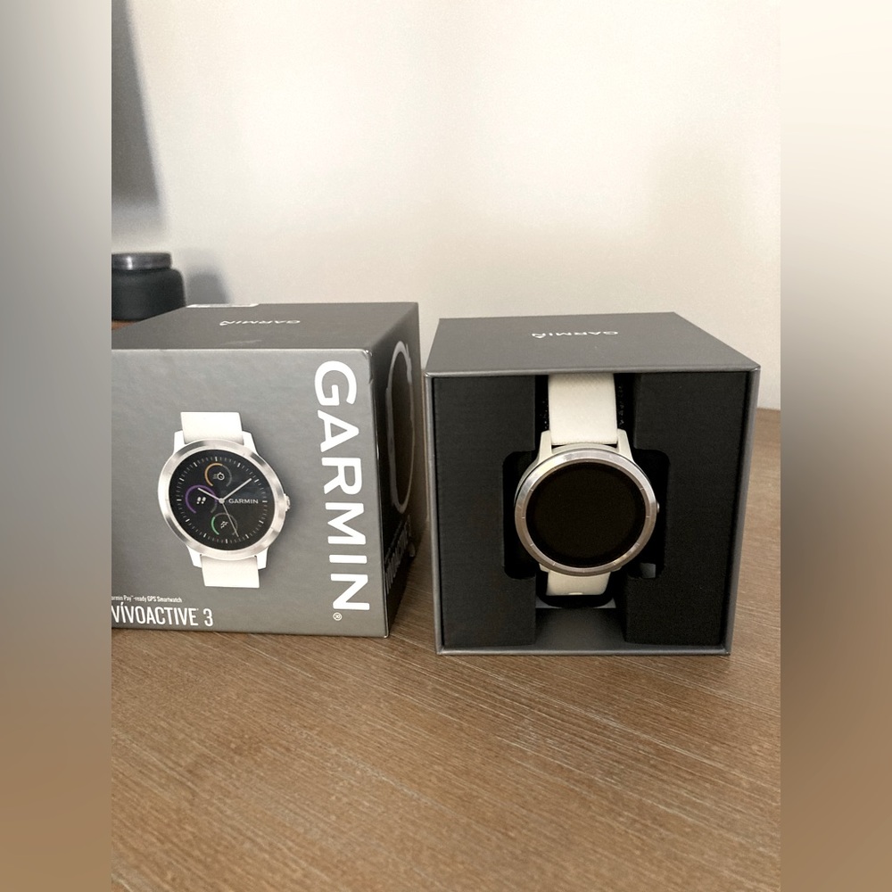 Garmin Vivoactive 3 Smart GPS Watch in white.